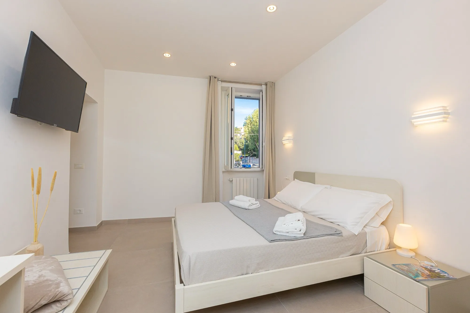 Main bedroom of the San Giovanni one-bedroom apartment